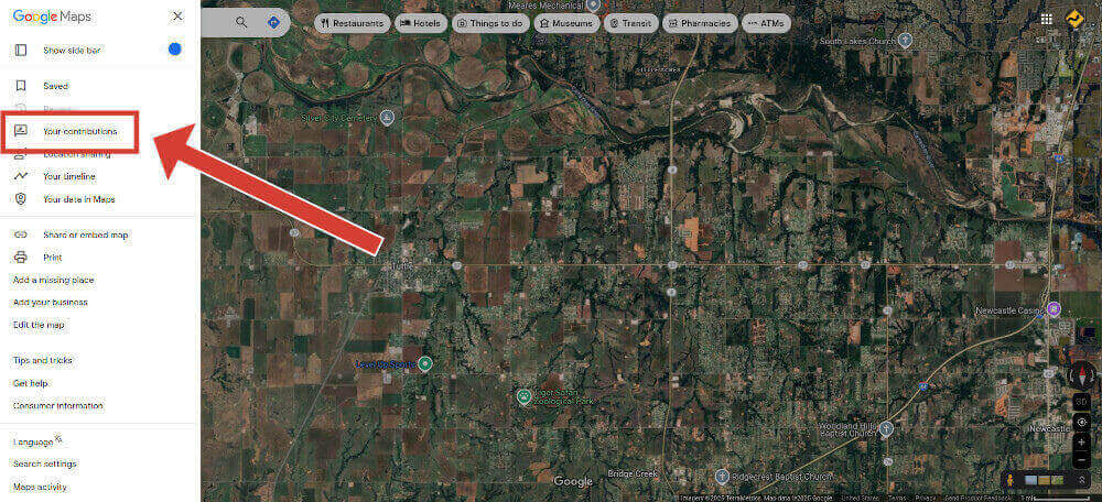 Choose "Your contributions" from the Google Maps menu options.