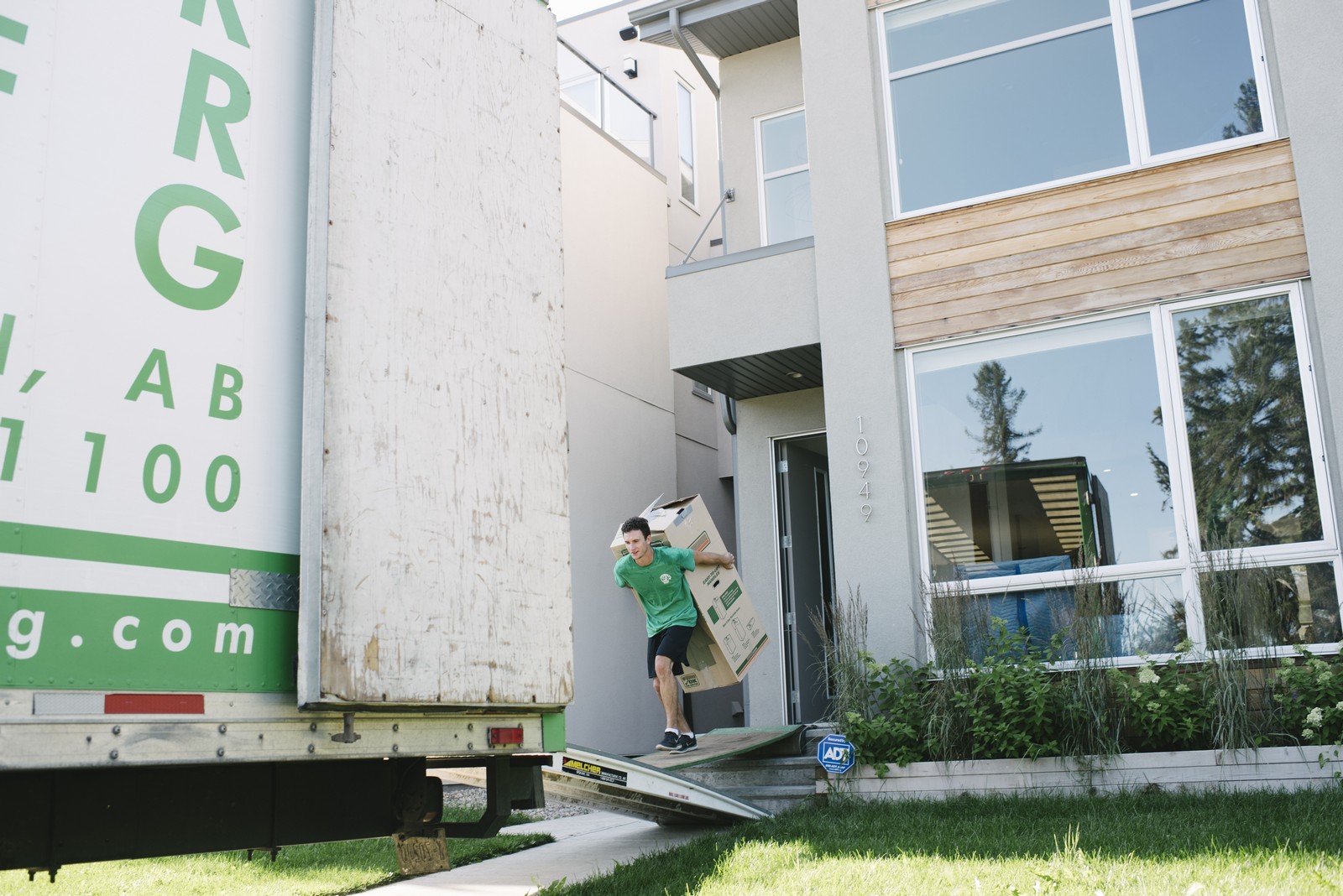 Moving company or delivery driver example of an employee at work. 